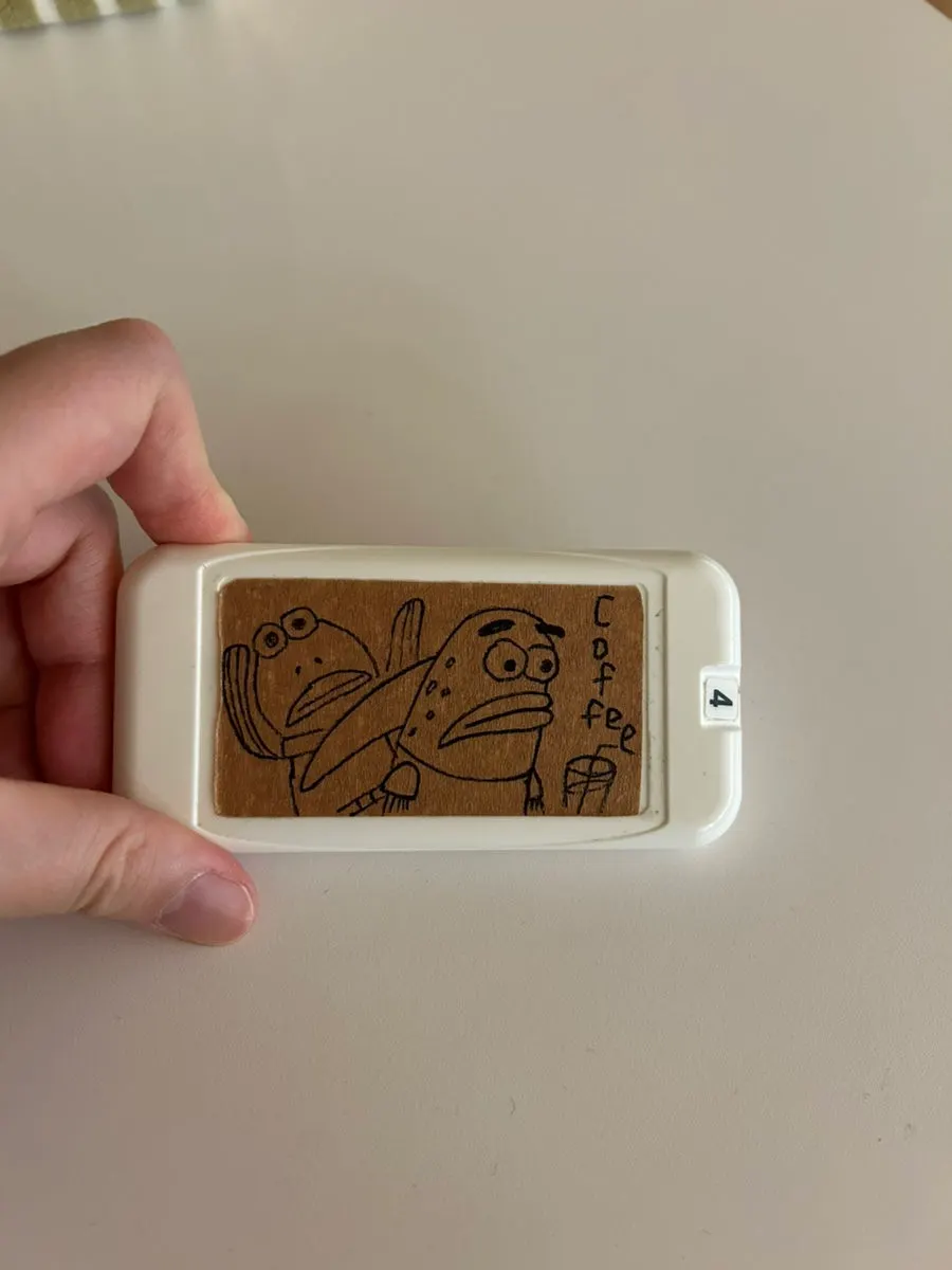 Café pager with hand-drawn details