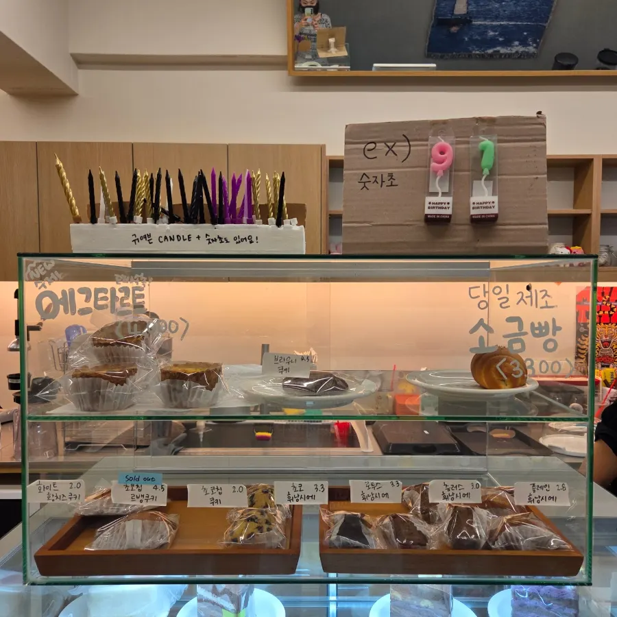 Glass dessert showcase beside the counter