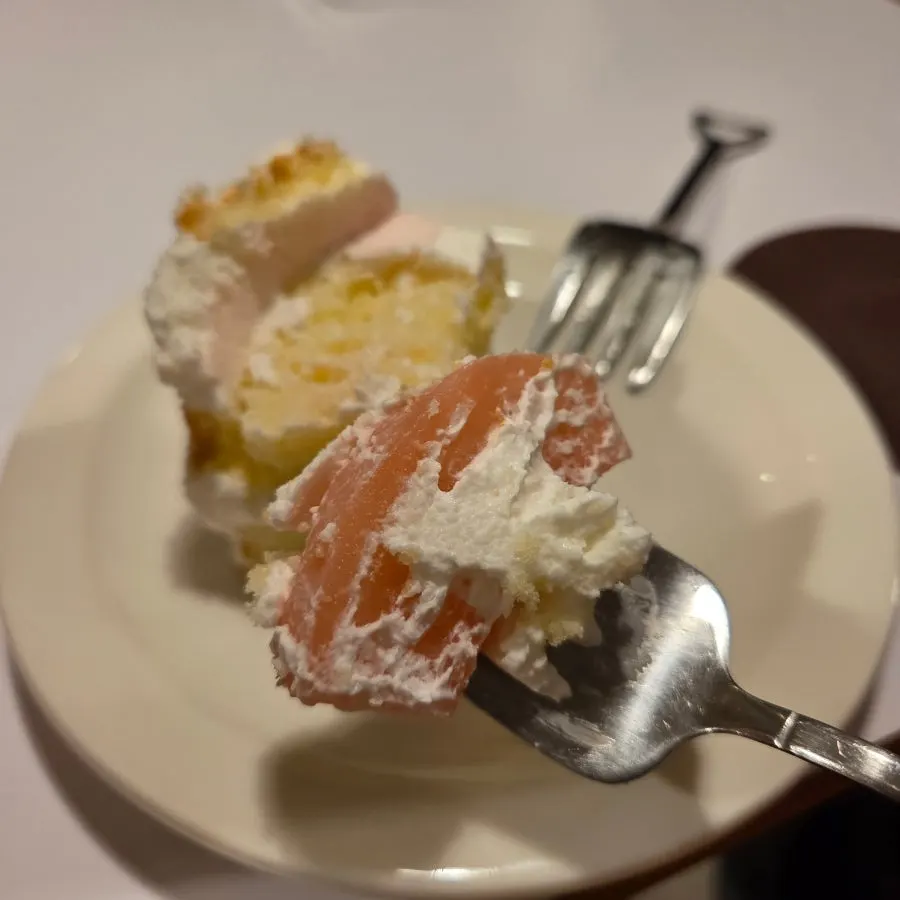 Peach yogurt cake plated on a dish