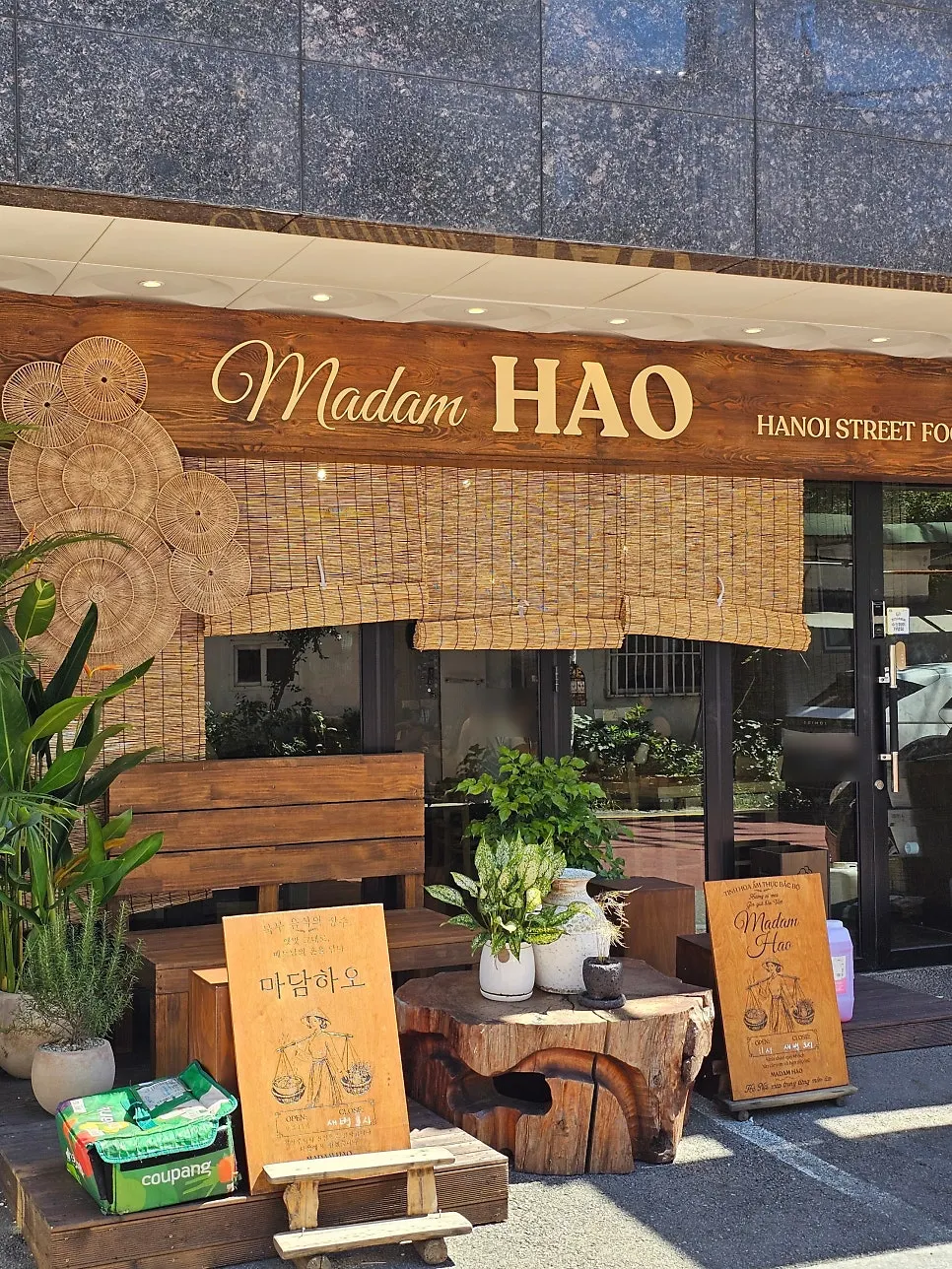 Madam Hao's exterior atmosphere decorated with bamboo blinds