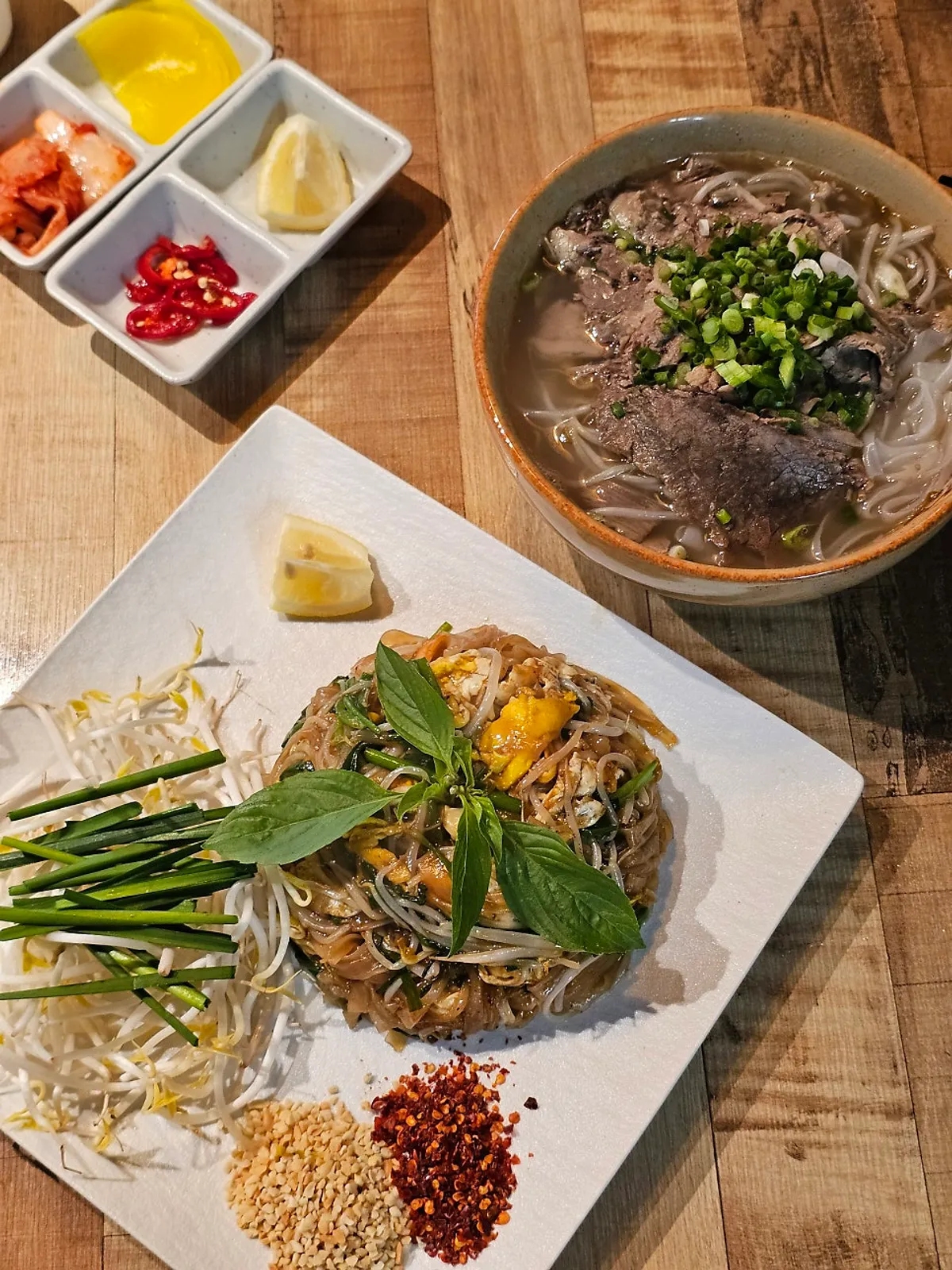 Lunch order of pad thai and beef brisket pho