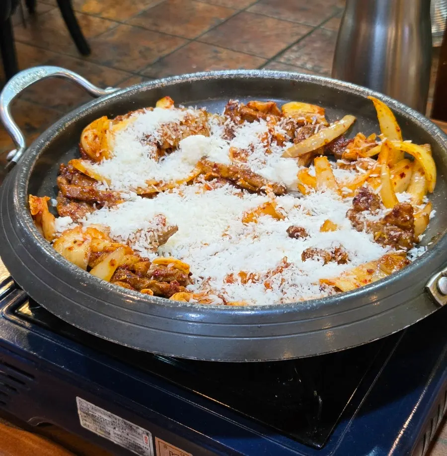 Pork kimchi stir-fry with extra cheese