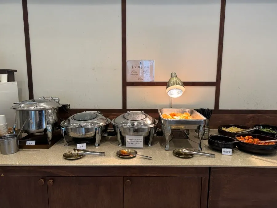 Sungnyung, japchae, and braised tofu at the self-serve bar
