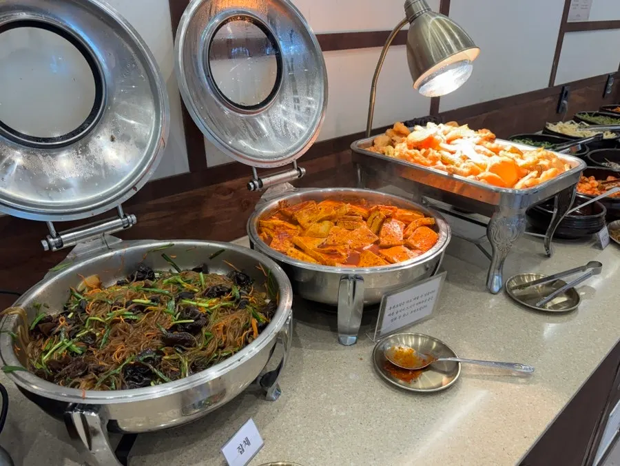 Freshly fried sweet pumpkin, eggplant, and shishito pepper fritters