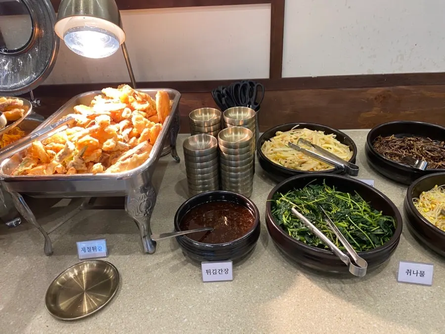 Self-serve bar with kimchi and wrap vegetables