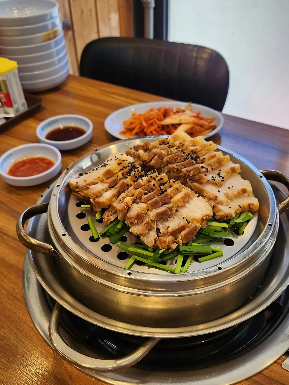 Medium bossam served on a portable gas burner