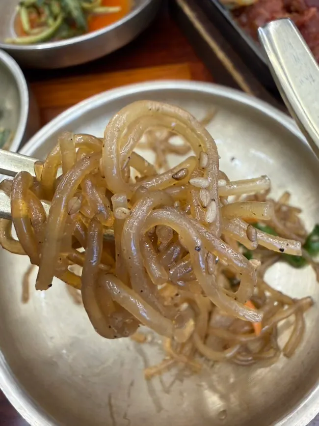 Small side dish plate with stir-fried pork
