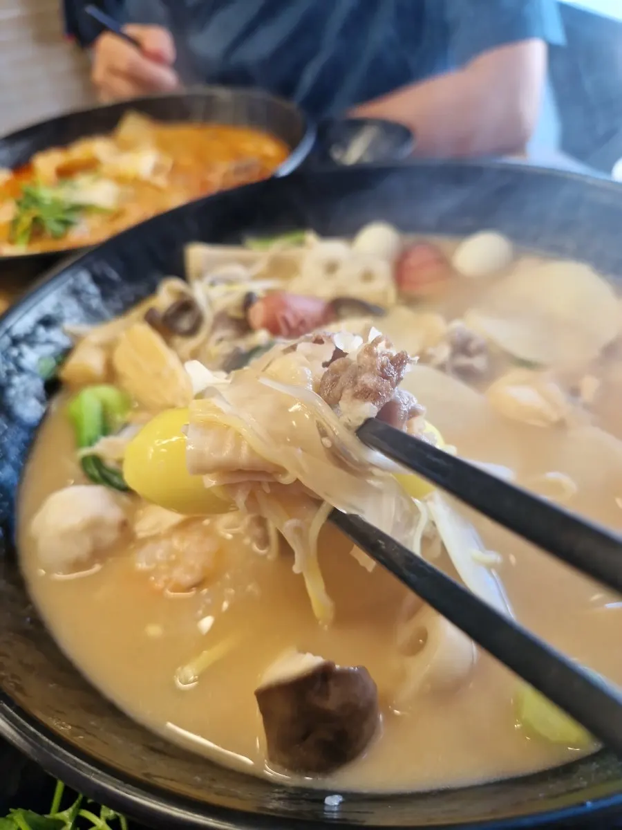 A bowl of beef bone broth malatang