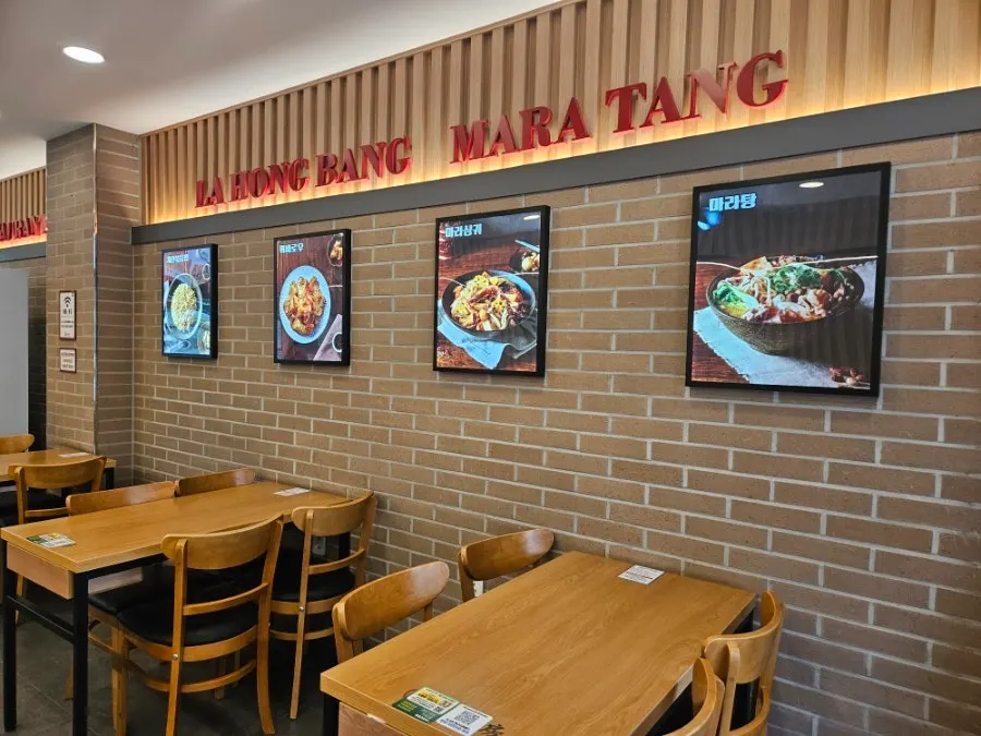 Interior of the malatang restaurant with solo-dining seats