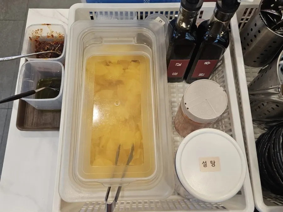 Sauces set out at the self-serve sauce bar