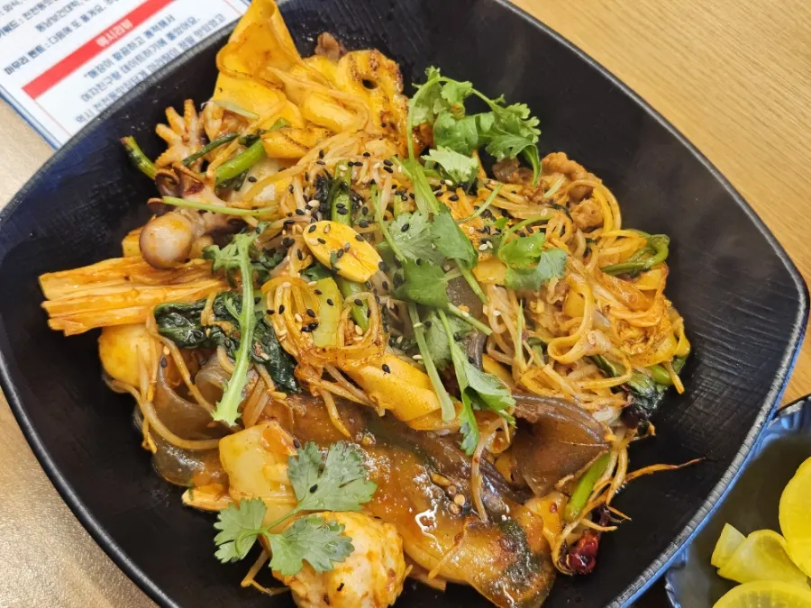 Chopsticks lifting mala xiang guo ingredients