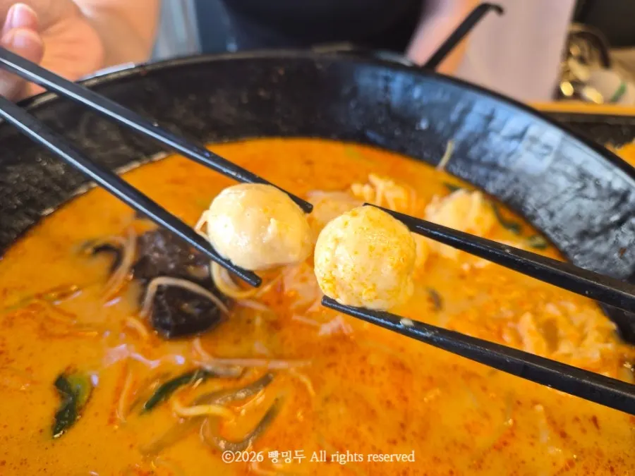 Skewered meatballs added into the malatang