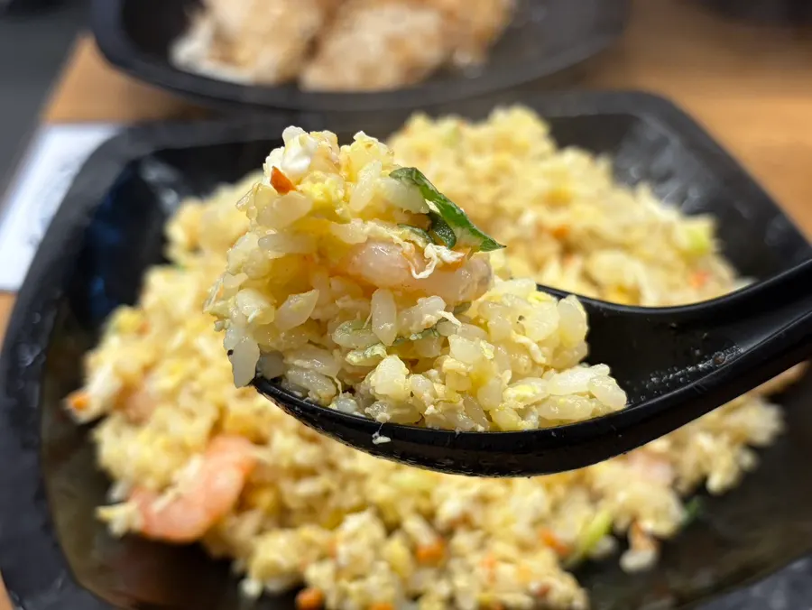 A plate of shrimp egg fried rice
