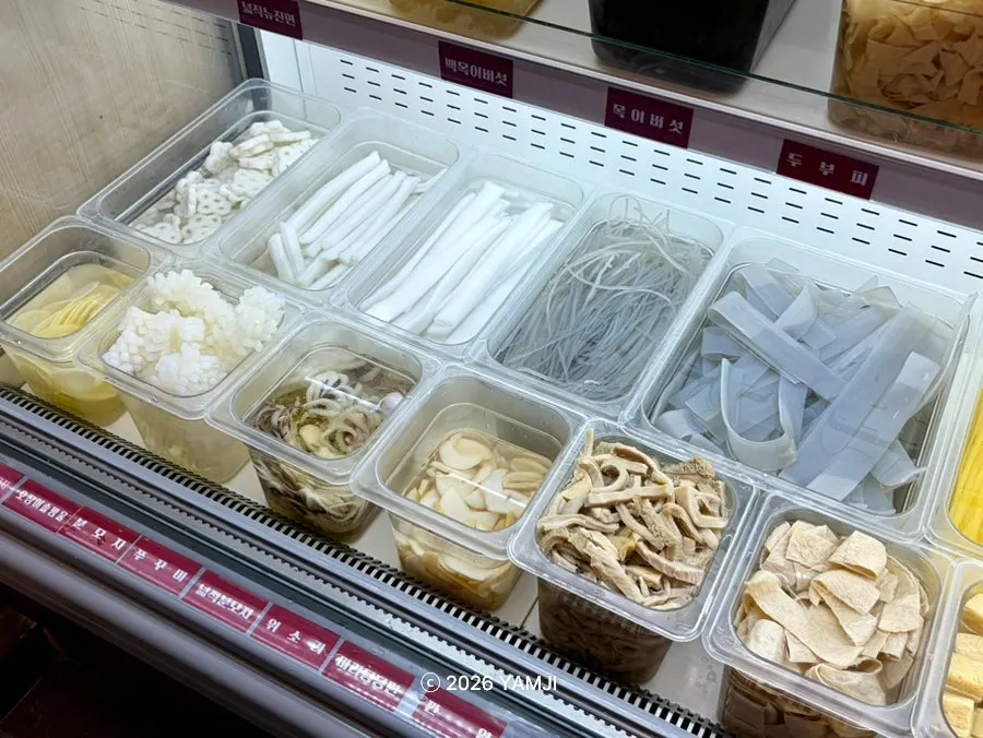 Self-serve malatang ingredient bar filled with items