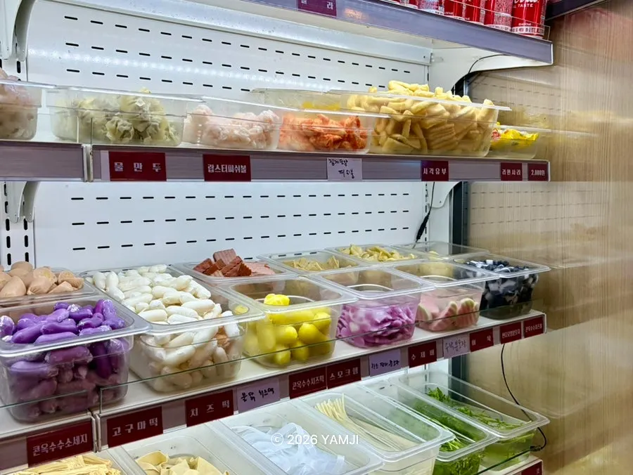Ingredient bar with tofu items and noodles