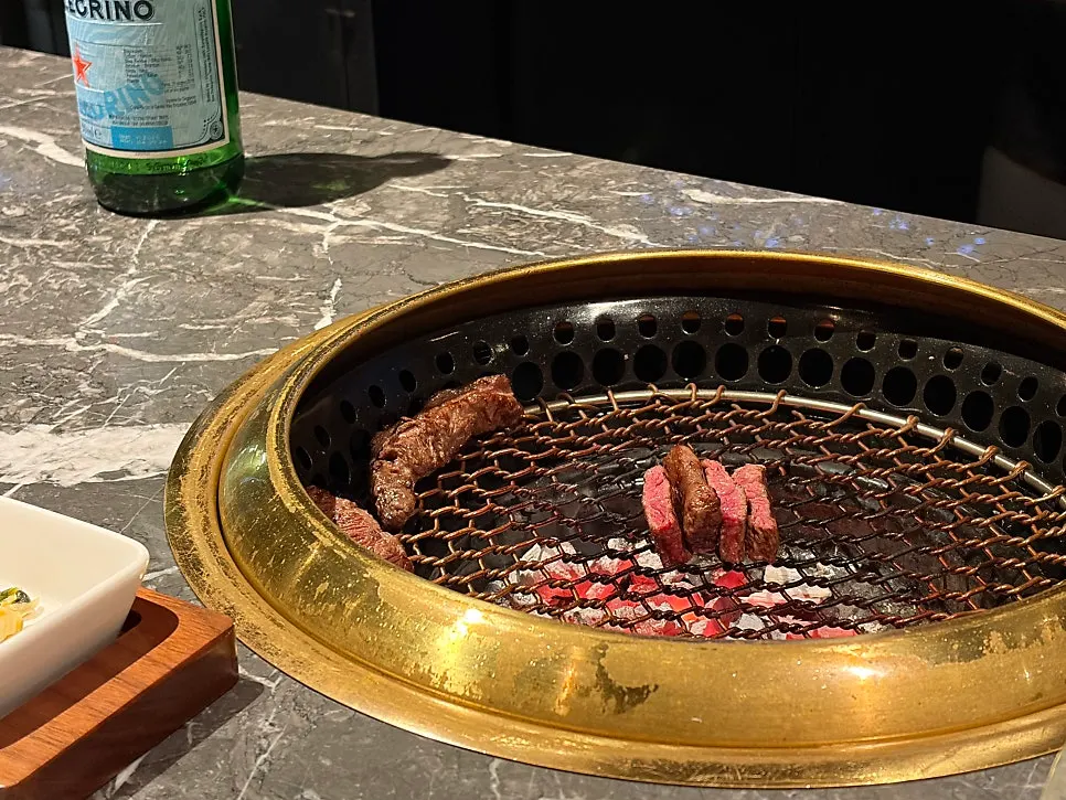 The owner grilling hanwoo tableside