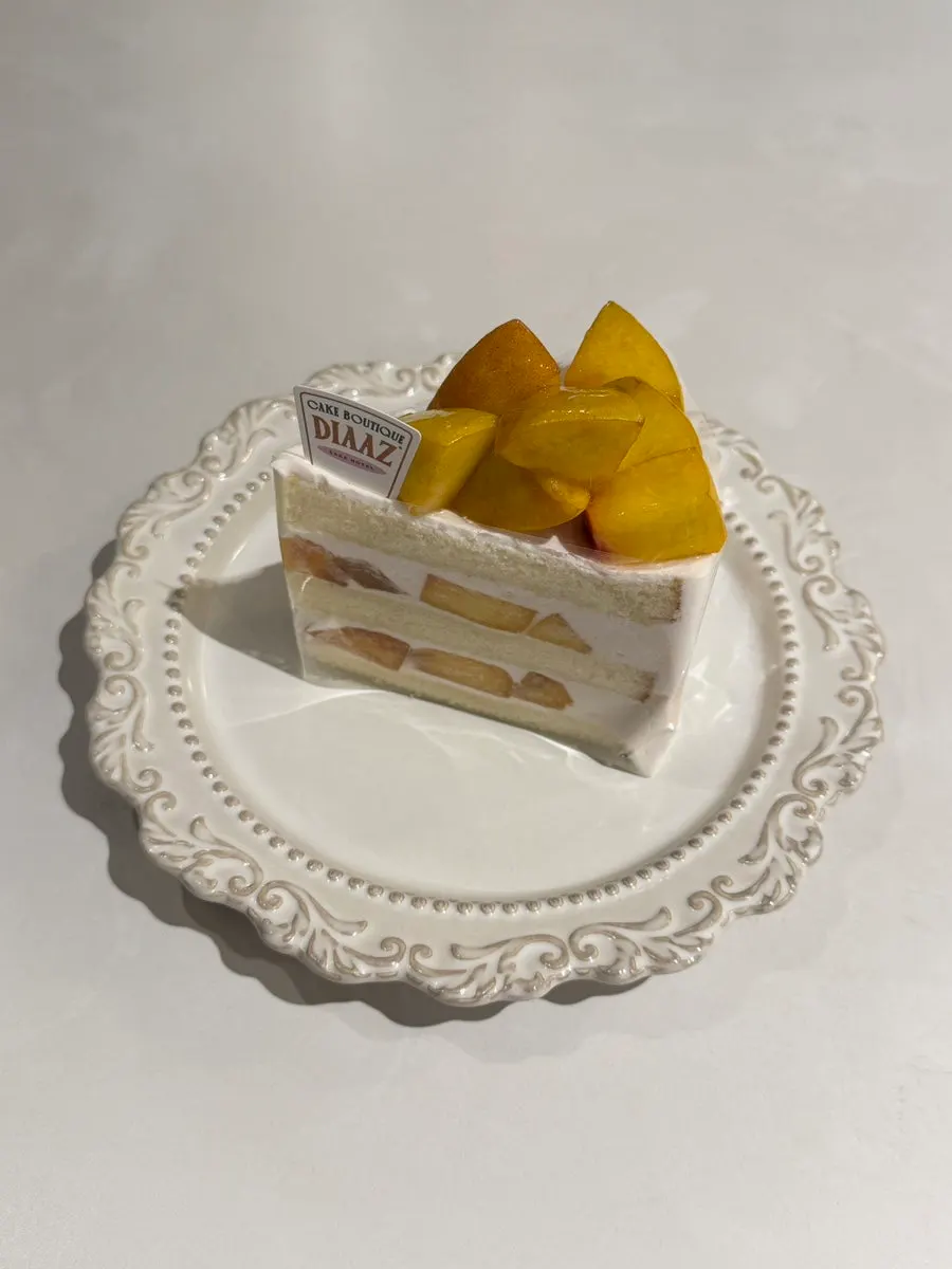 A slice of peach cake at Diaz Cake Boutique