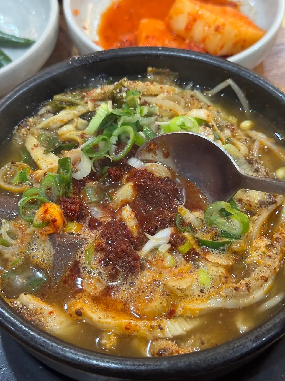 Full table setting with tripe soup