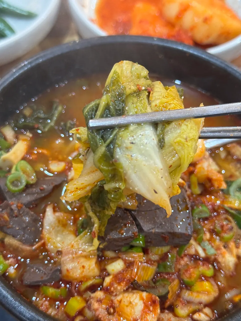 Spoonful of tripe soup broth