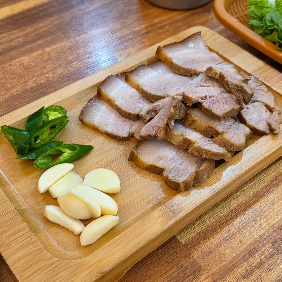 Plate of dombe pork served with dipping sauce
