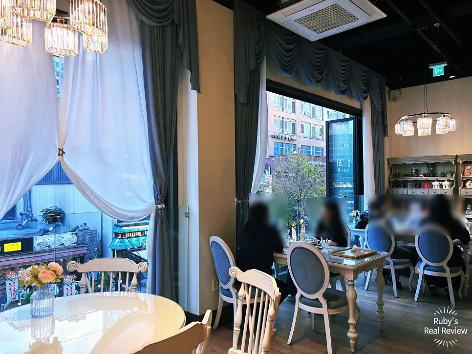 Corridor-style interior passage at the café