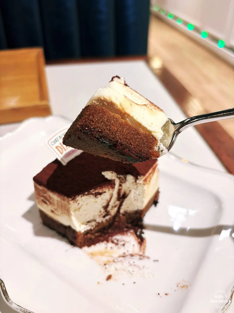 Cross-section of tiramisu with marbled espresso