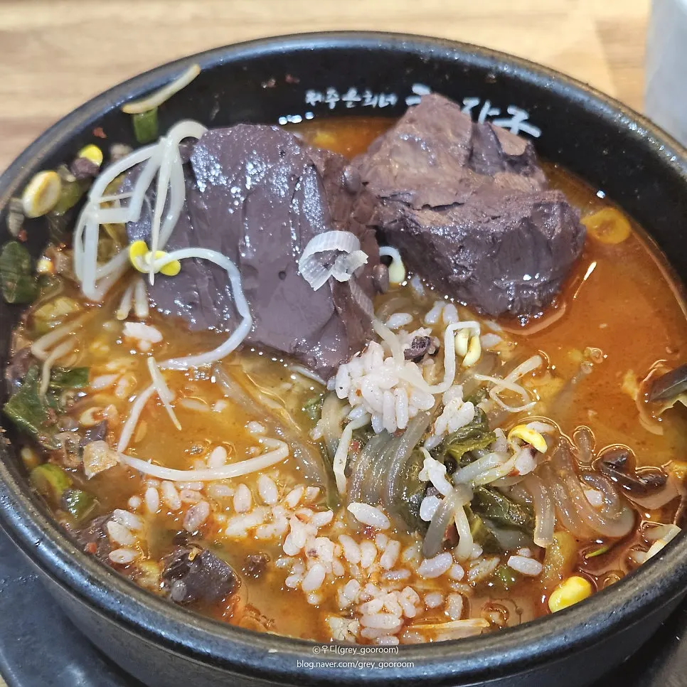 Earthenware pot of blood-tofu soup add-on, packed with blood tofu