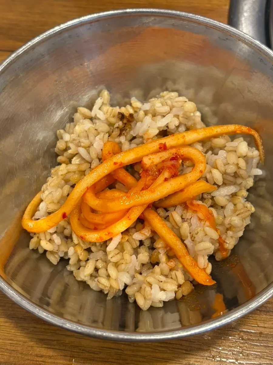 A bowl of warm barley rice