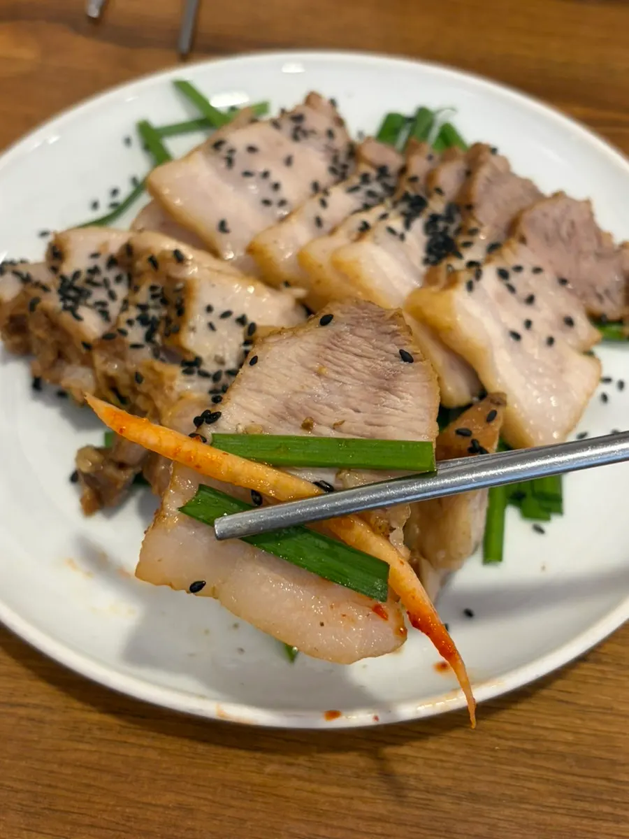 A piece of pork paired with dried radish
