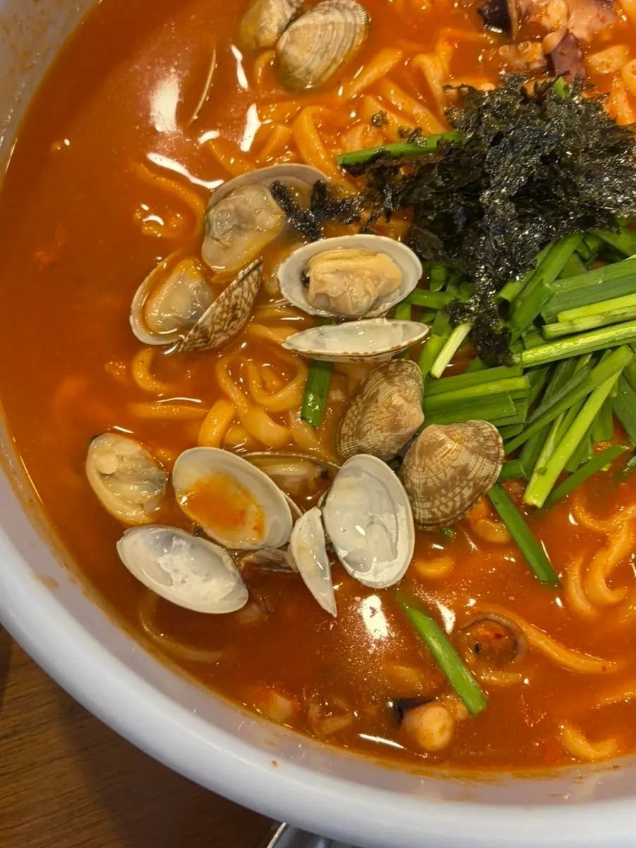 Kalguksu noodles and octopus combined in kal-nakji