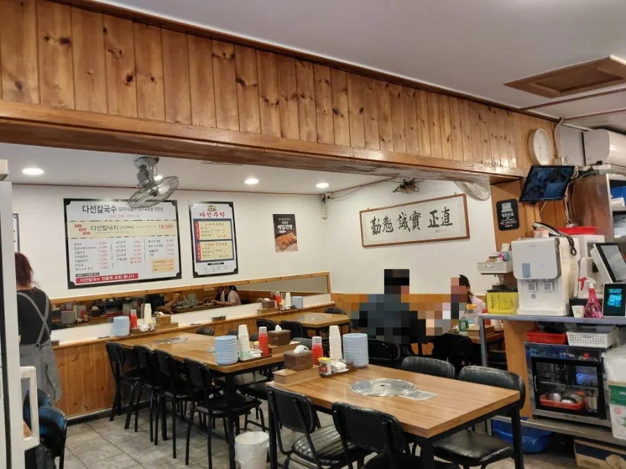 Wood-toned interior of Daseon Kalguksu Main Branch