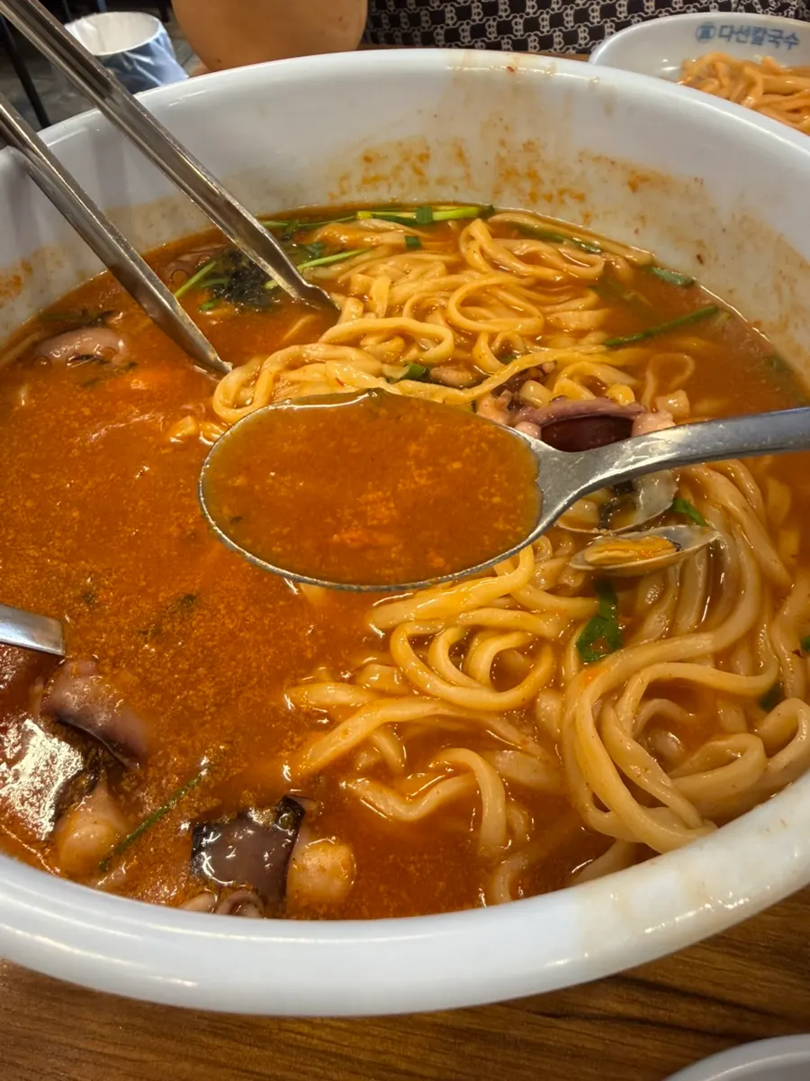 A spoonful of spicy, refreshing kal-nakji broth