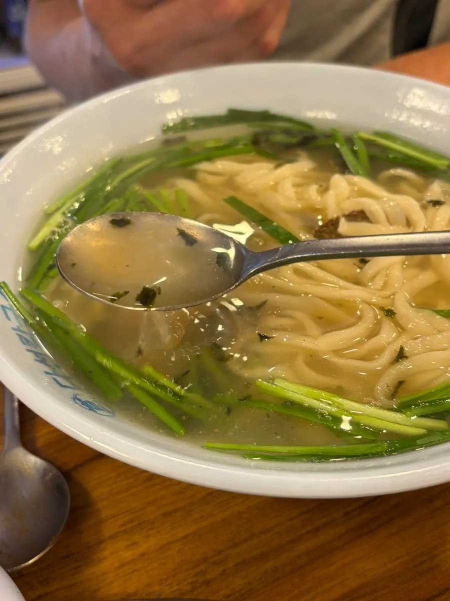 A full spread of dishes shared with parents at Daseon Kalguksu