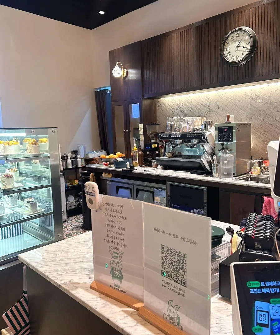 Clean, upscale interior entrance of the Cake Boutique