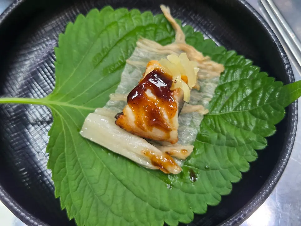 Eel grilled golden over charcoal