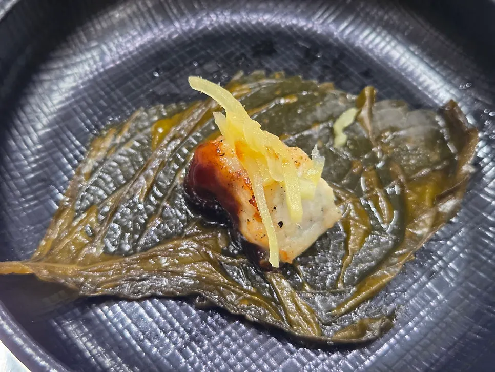 Grilled eel cut into bite-sized pieces
