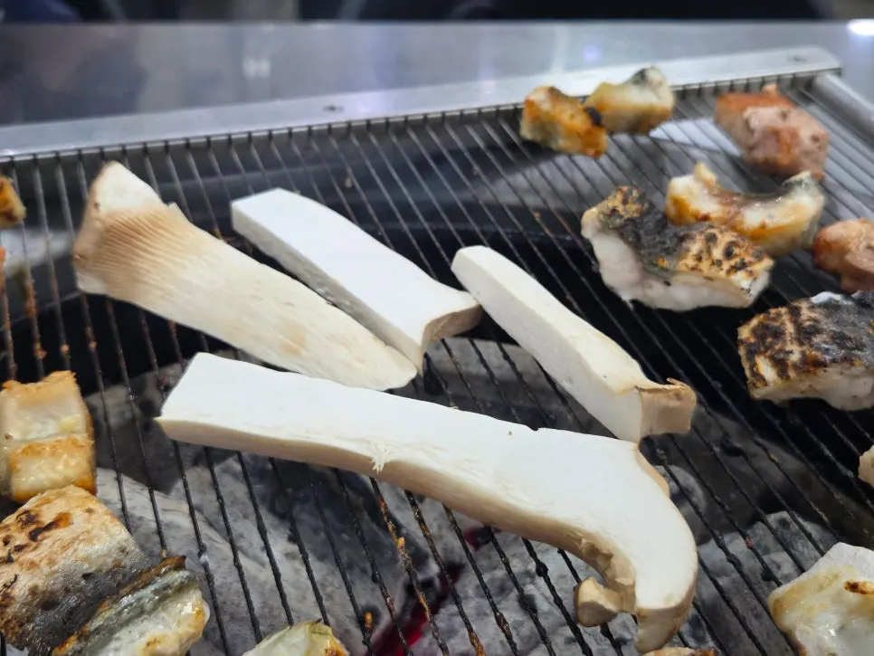 King oyster mushrooms grilled alongside the eel