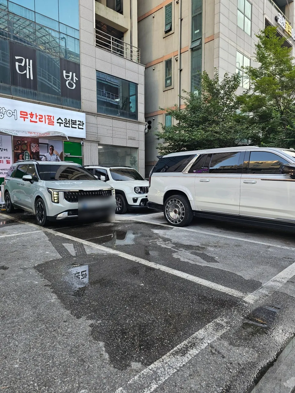 View of the rear ground-level parking lot