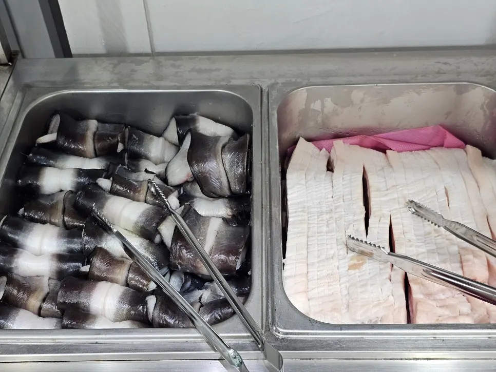 Fresh raw freshwater eel displayed at the self-serve corner