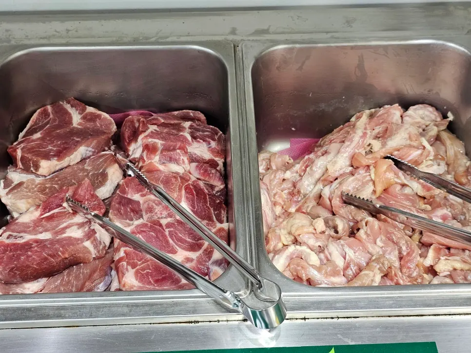 Pork belly and chicken neck at the self-serve corner