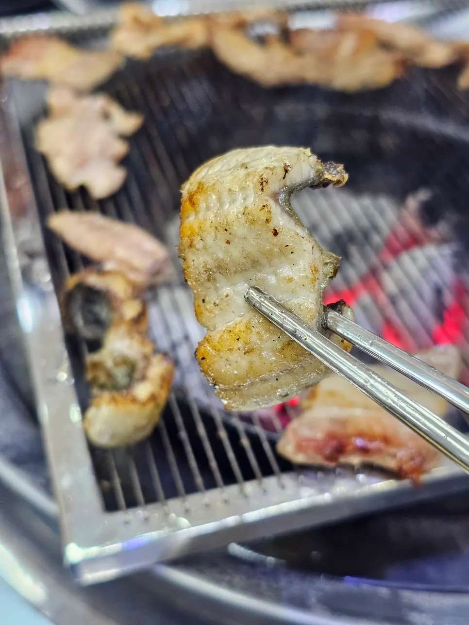 Grilled eel cut into bite-sized pieces