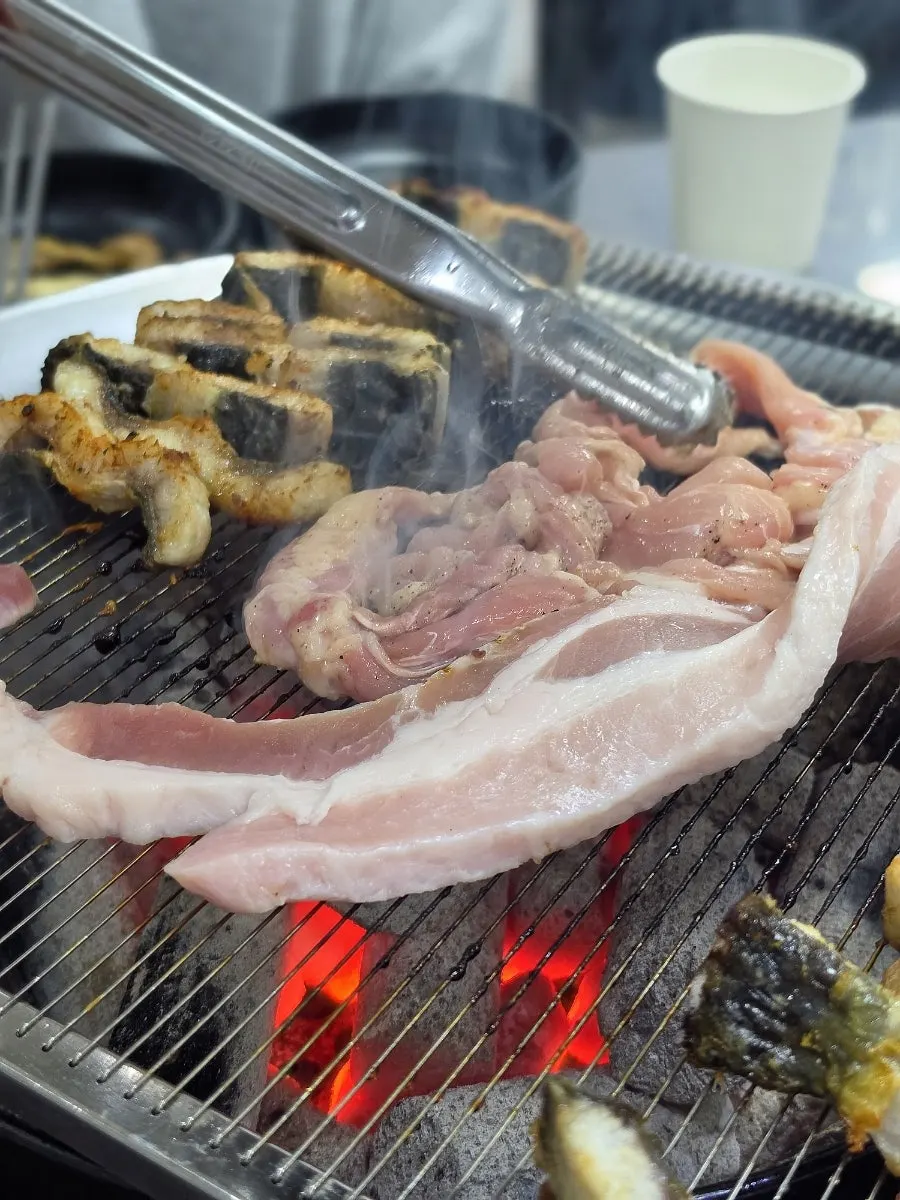 Eel and side vegetables on the grill