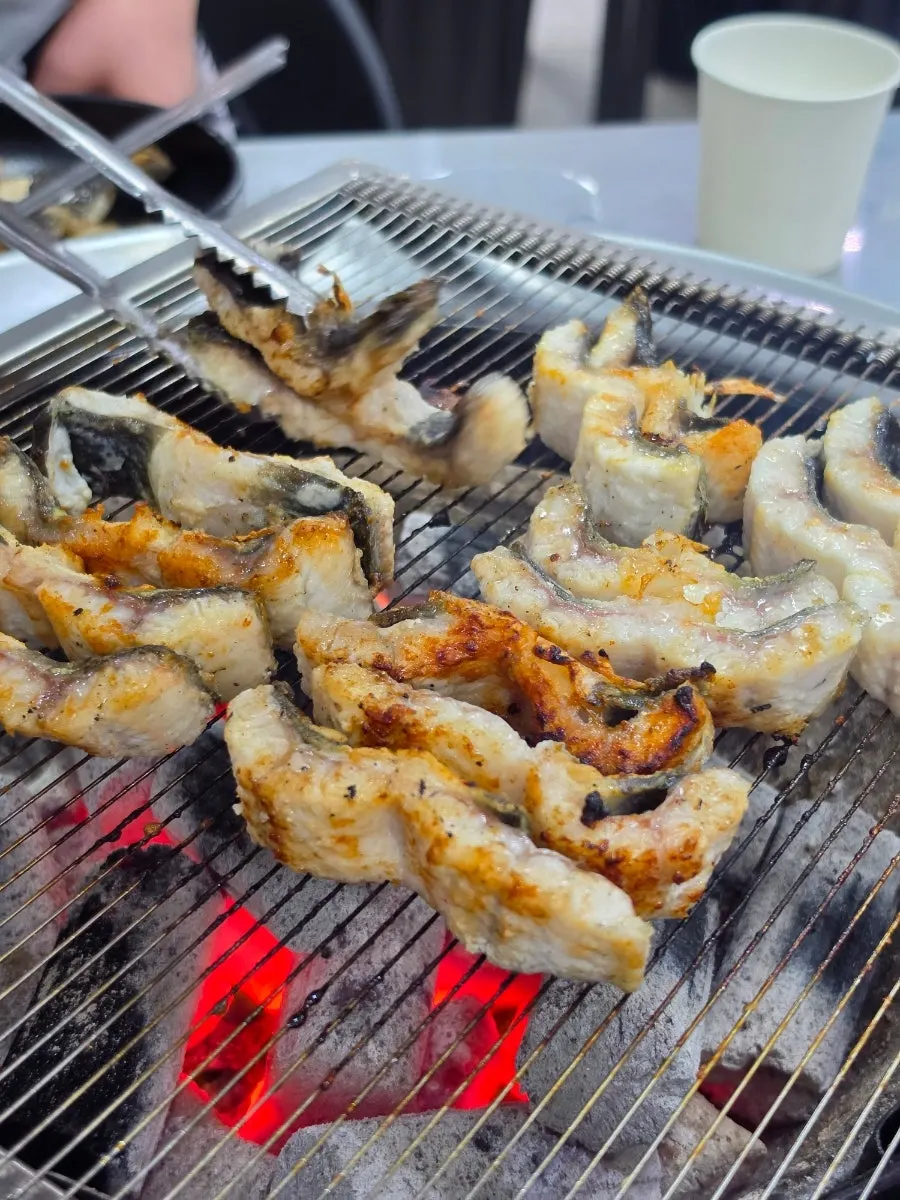 The charcoal grilling table near the end of the meal