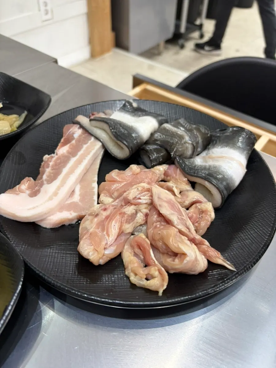 First tray with eel, pork, and chicken neck