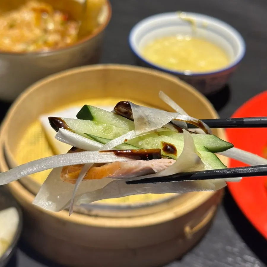 Peking duck pancake with meat and vegetables