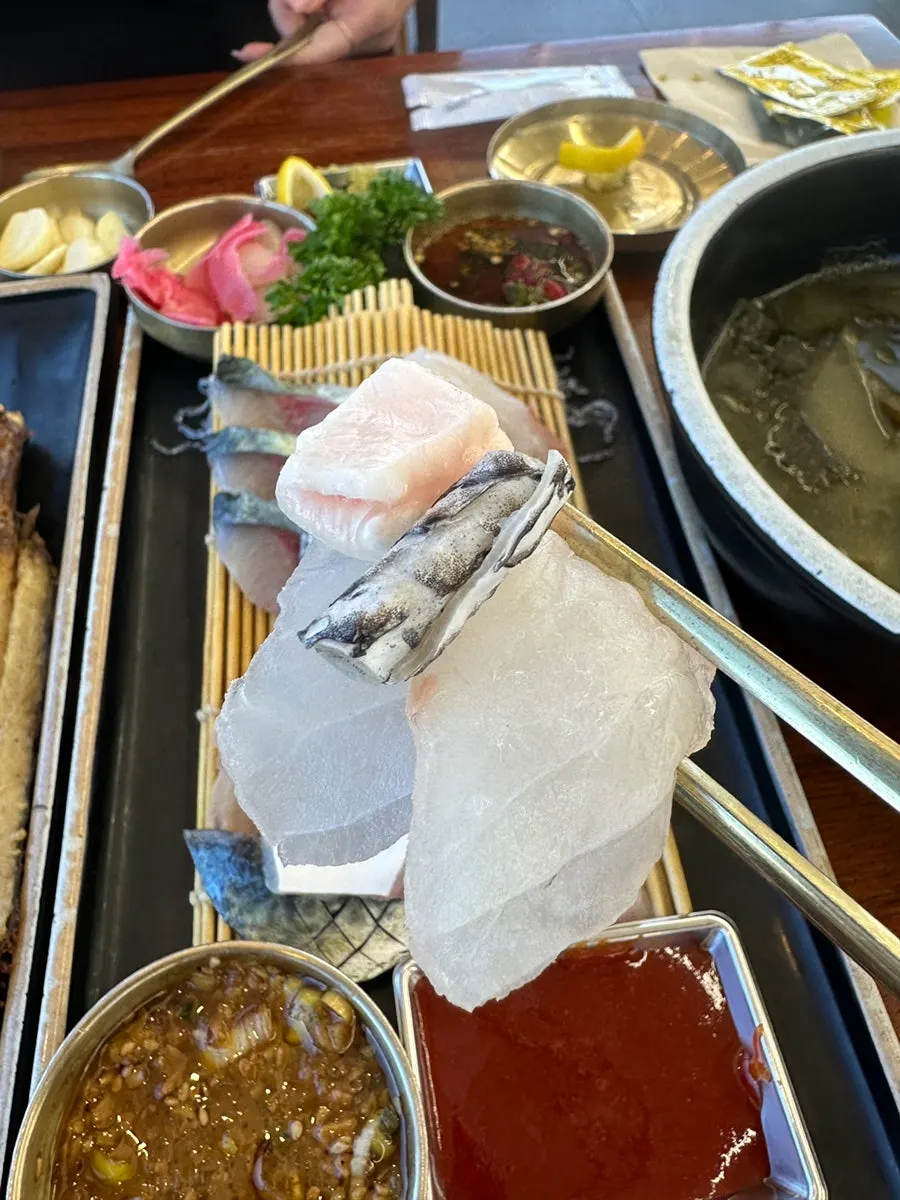 Plate of plump sliced mackerel sashimi