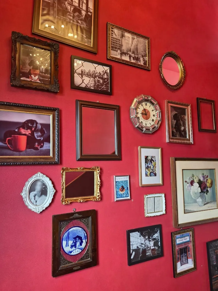 Café seating area with an American flag and vintage props