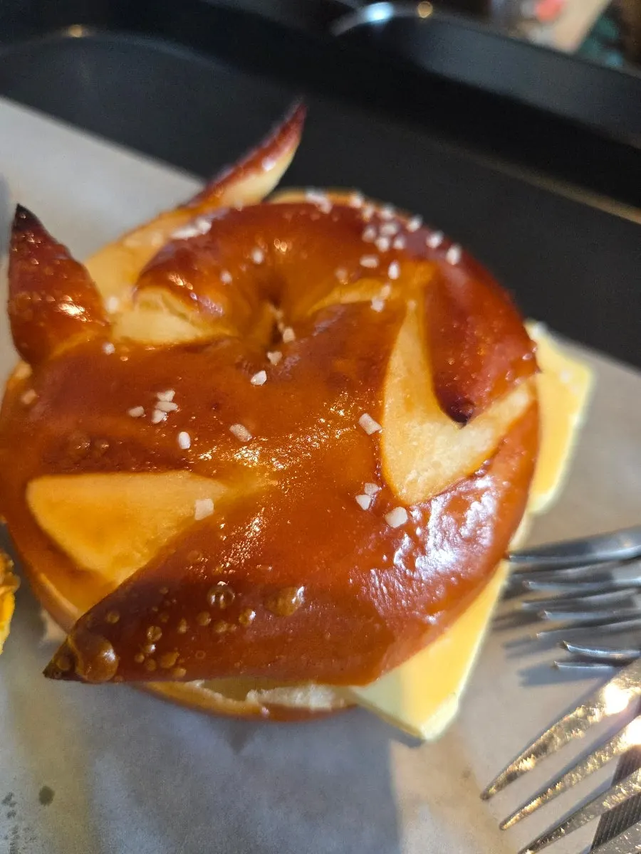 Potato bagel packed with potato salad and bacon