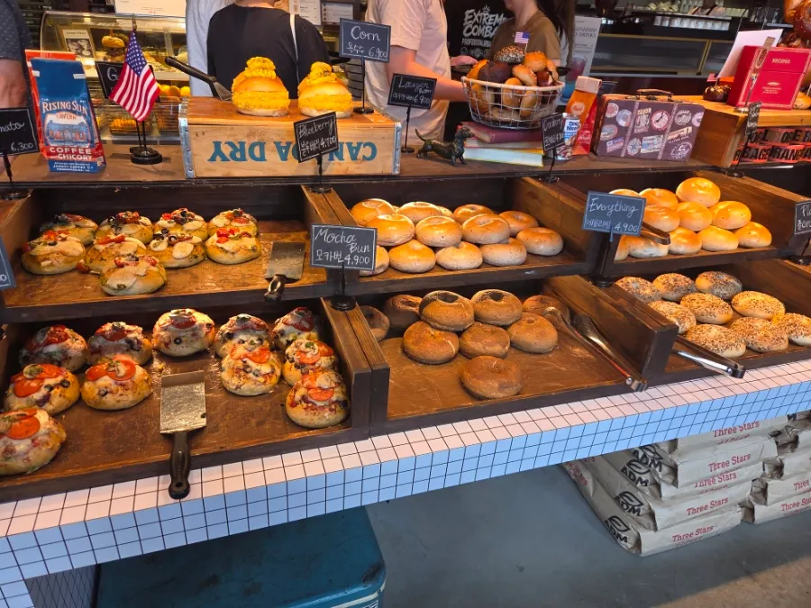 Bagels lined up side by side on the table