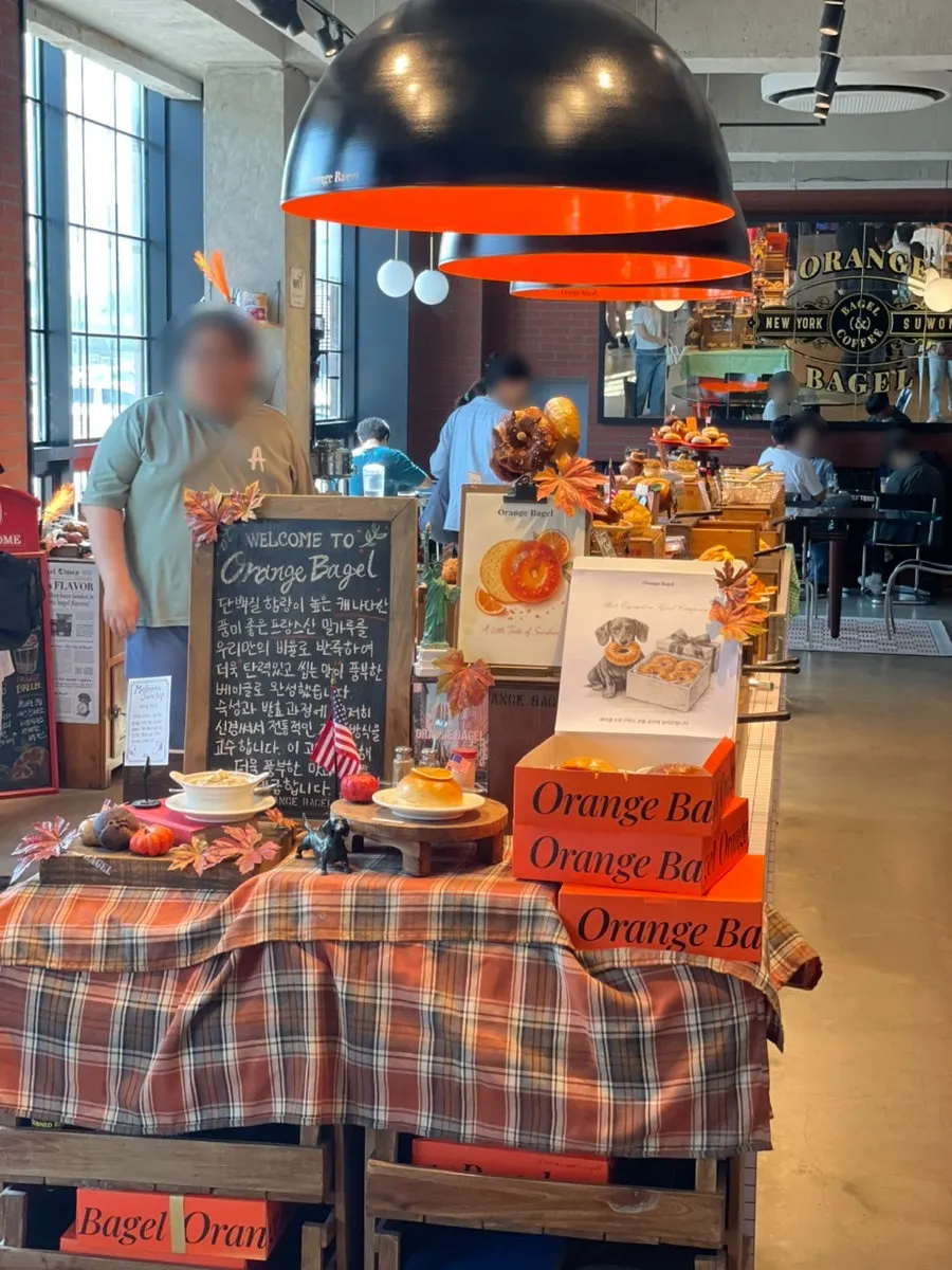 Orange Bagel's 1st floor ordering counter and interior